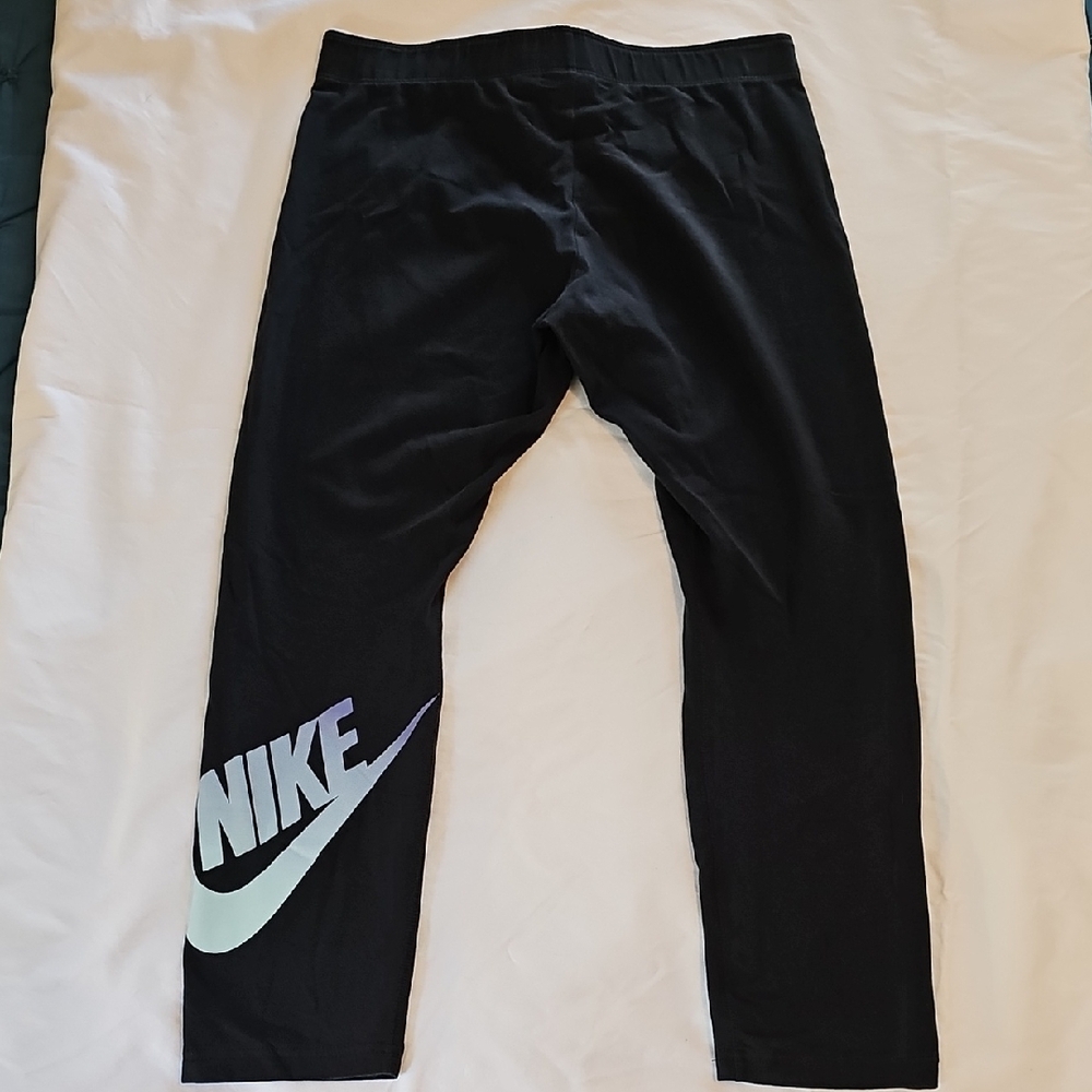 Nike Black Leggings with Bold Swoosh Design